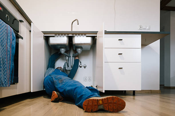 Professional Plumbing technician working in Holmesville, OH